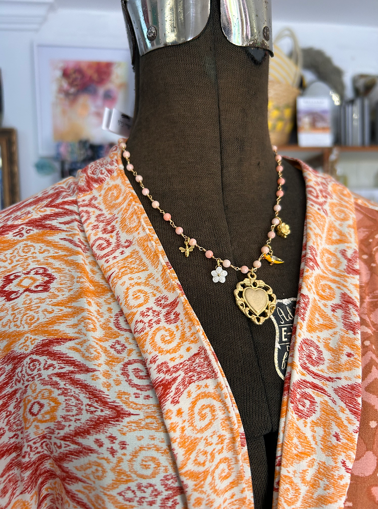 Orange kimono on dress form